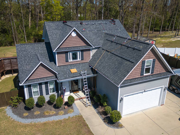 Best Storm Damage Roof Repair  in Iola, WI